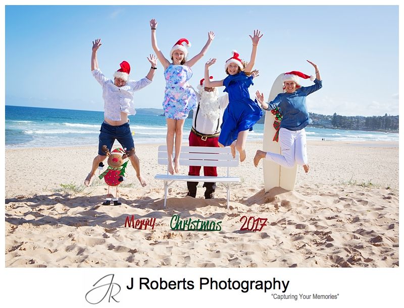 Last Aussie Santa Photo Sessions for 2017 on the beach at Long Reef